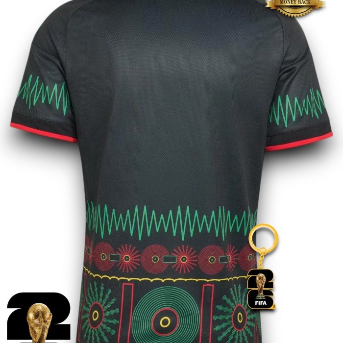 Jamaica_26_x_Bob_Marley_Away_Jersey_Black_KD0957_02_laydown_ca245d17-aca7-4b92-8cee-30cbd34abb6a.jpg